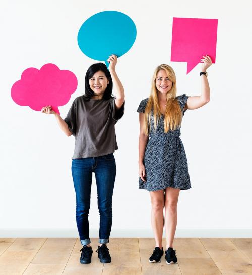 Cheerful people holding speech bubble icon - 414596