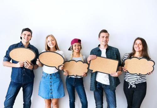 Happy young adults holding up copyspace placard thought bubbles - 383969