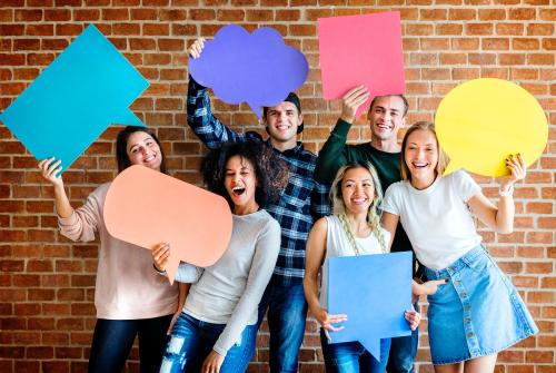 Happy young adults holding empty placard thought bubbles copyspace - 384073