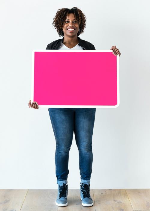 Black woman holding blank board - 388441