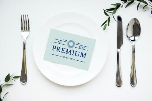 Mockup design space paper card on a plate - 296278