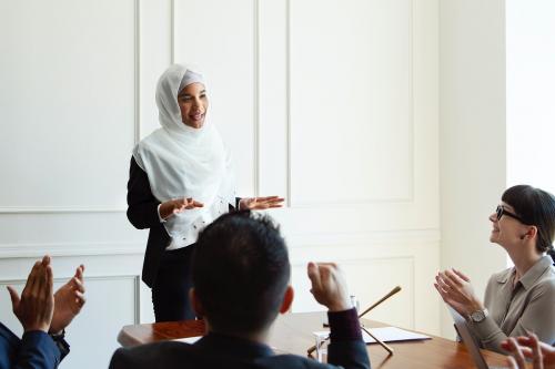 Muslim businesswoman presenting in an office meeting - 1208701
