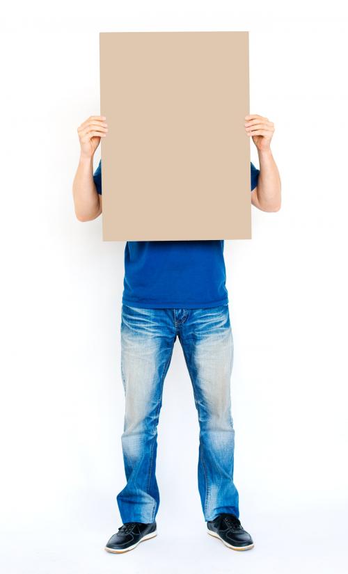 Man holding a blank brown board - 325439