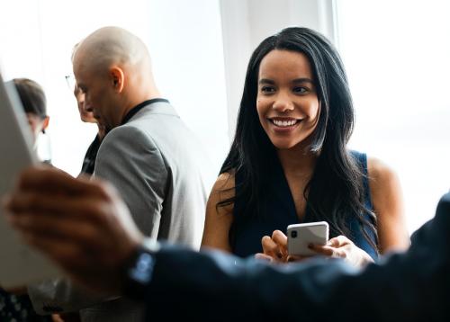 Black businesswoman using a mobile phone - 1216630