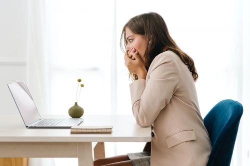 Depressed businesswoman overwhelming with her work - 1212683