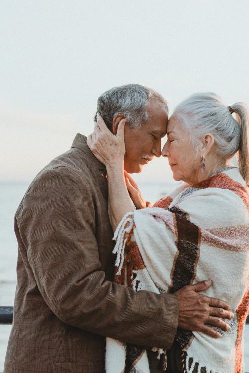 Romantic senior couple by the pier - 1202662
