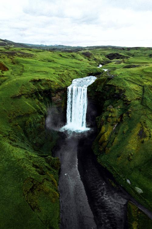 Drone shot of Skógafoss waterfall, Iceland - 1206132