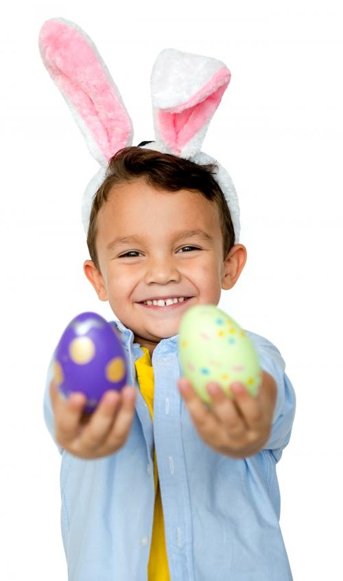 A boy with bunny hairband and easter eggs - 7149