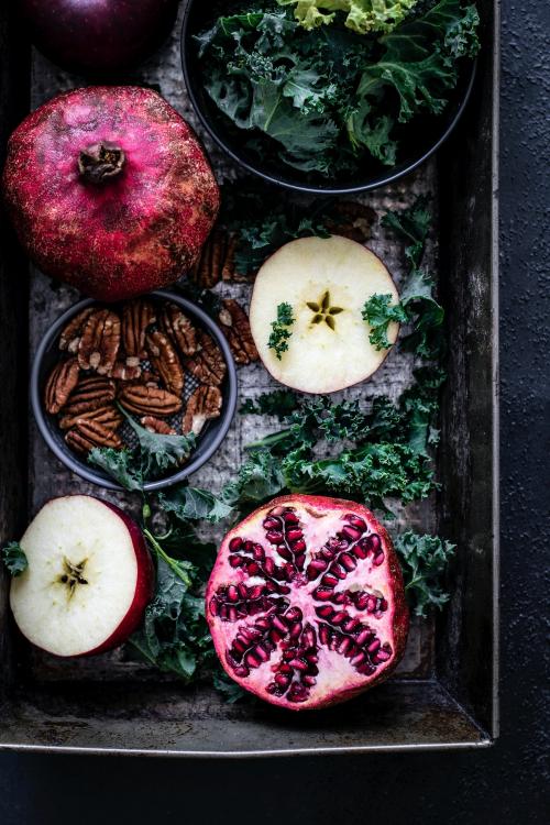 Fresh pomegranate with apples and pecans food photography - 1054340