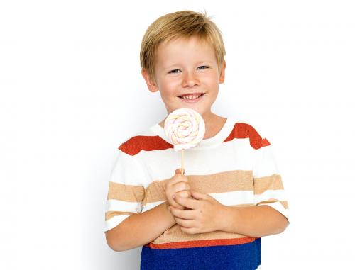 Cute blond boy with a big lollipop - 7334