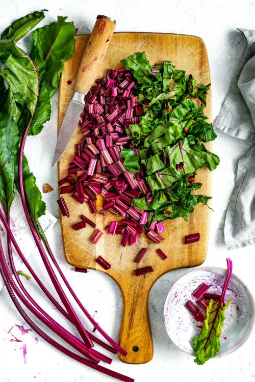 Chopped beetroot on a wooden board aerial view - 1204800