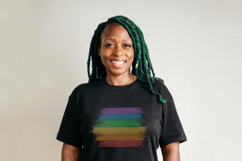 Black lesbian wearing a rainbow print t-shirt - 1205373