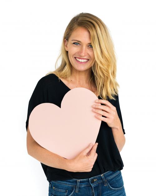 Caucasian woman holding a heart - 6950