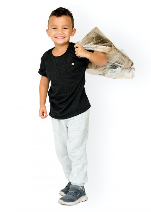 Little boy holding paper to recycl - 4927