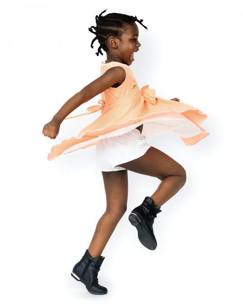 African little girl playful dancing studio portrait - 5183