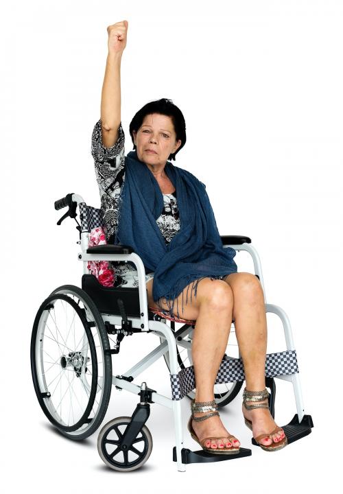 Woman sitting on wheelchair photoshooting in studio - 4894