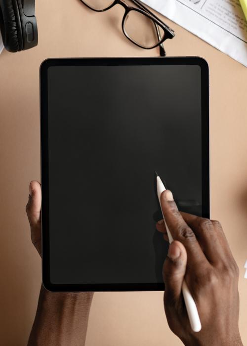 Black woman using a digital tablet mockup - 1213847
