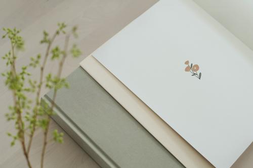Card mockup on a gray book - 1215235