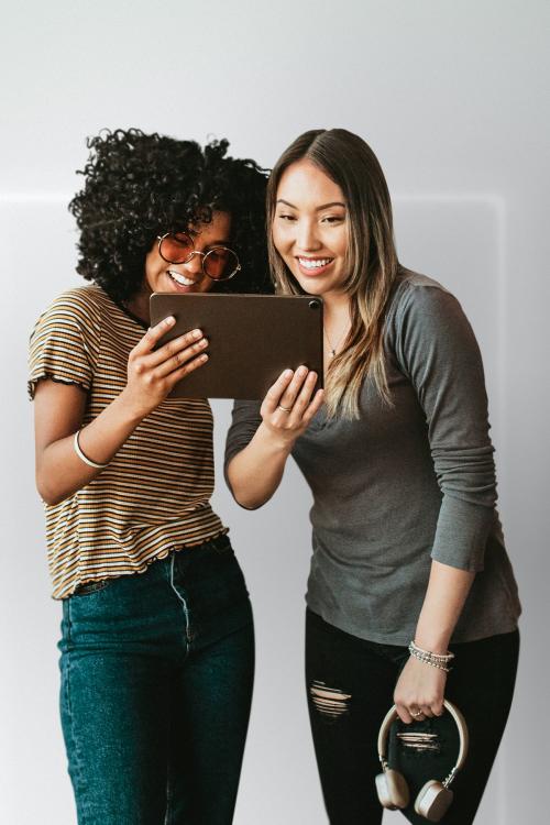 Diverse friends watching an online video clip on a digital tablet mockup - 1223902