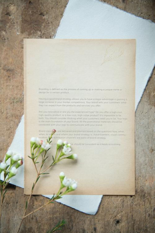 Grunge brown letter mockup with waxflower - 1209295