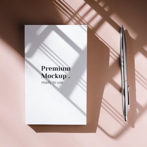 Pen and white notebook mockup - 2281517