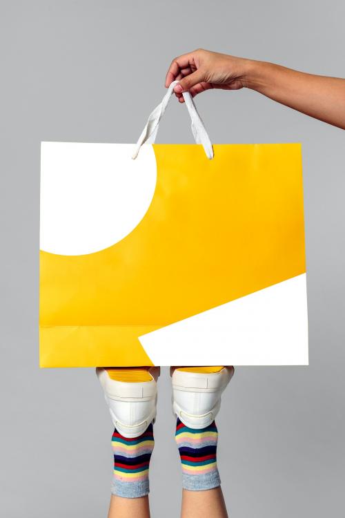 Woman carrying a shopping bag mockup - 2287511