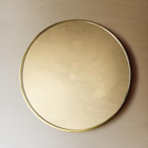 Gold framed mirror on a brown wall mockup - 2036833