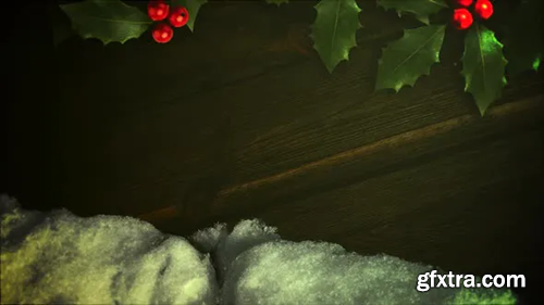 Videohive Animated closeup white snow and green Christmas branch on wood background 29540148