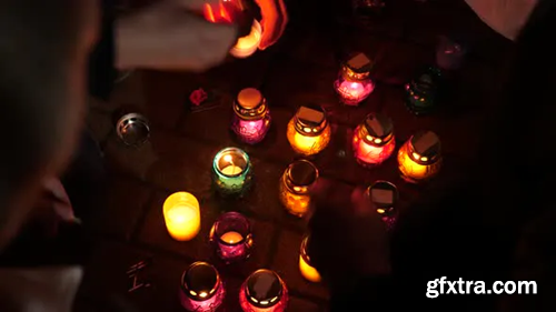 Videohive Remembrance Day. Holocaust. Terror Victims Memorial. Hands Lighting Candles. Burning Candles 28332272