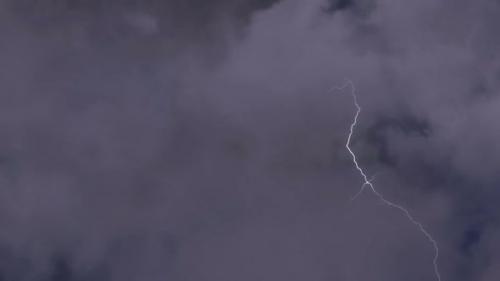 Videohive - Airplane Flying Through Heavy Thunderstorm Clouds, Lightning Bolts Strike Ahead - 24681672