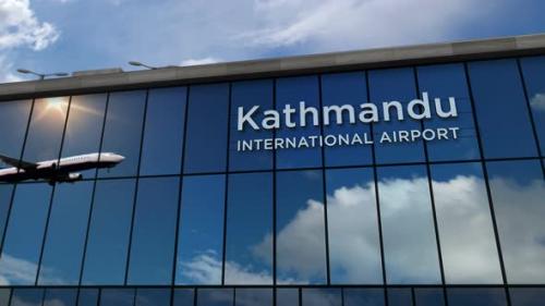 Videohive - Airplane landing at Kathmandu Nepal airport mirrored in terminal - 32618718