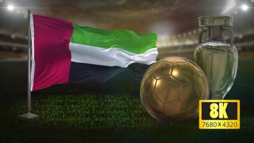 Videohive - 8K United Arab Emirates Flag with Football And Cup Background Loop - 32695064