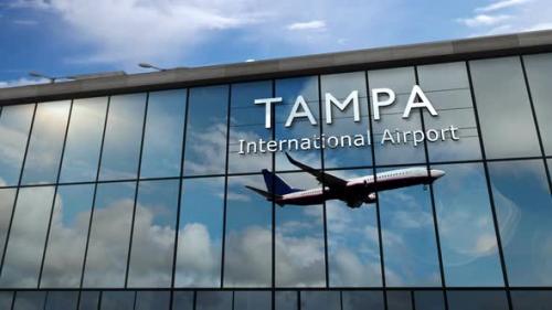 Videohive - Airplane landing at Tampa Florida, USA airport mirrored in terminal - 33108941