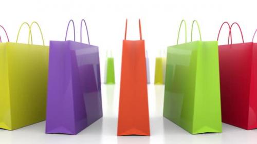 Videohive - Multicolored consumer shopping bags rotating isolated on the white background - 33229386