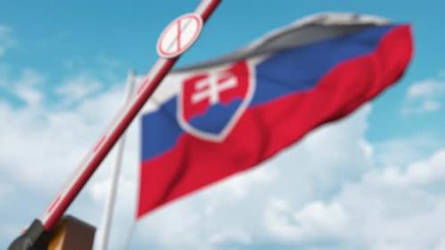 Videohive - Closing Barrier with STOP CORONAVIRUS Sign at the Slovak Flag - 33285069