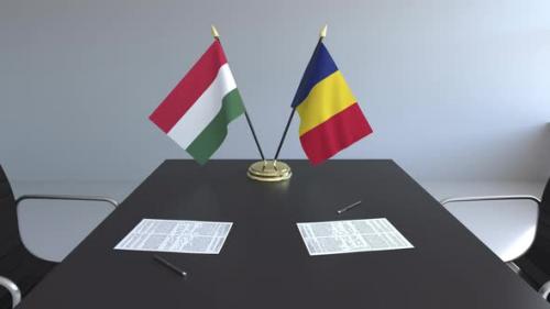 Videohive - Flags of Hungary and Romania and Papers on the Table - 33386797