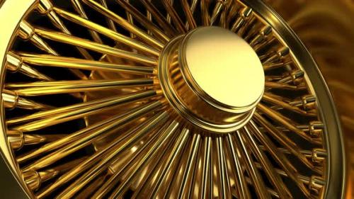 Videohive - Looping Close Up View Triple Gold Wire Wheel With Tire - 33387515