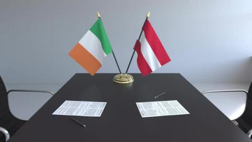 Videohive - Flags of Ireland and Austria on the Table - 33429092