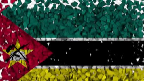Videohive - Mozambique Flag Breaking Rocks Transition - 33607822