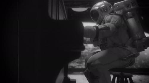 Videohive - Astranaut in a Spacesuit Plays the Piano in a Spaceship Overlooking the Planet Earth - 33671821