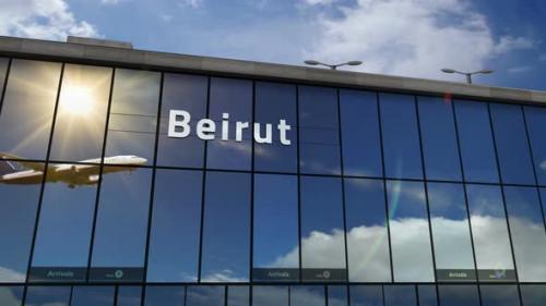 Videohive - Airplane landing at Beirut Lebanon airport mirrored in terminal - 33848128