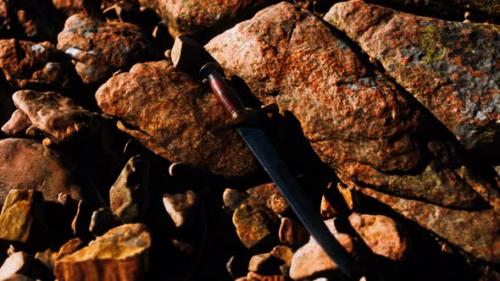 Videohive - Old Dagger on the Rock at Sunset - 34136734