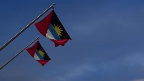 Videohive - Antigua And Barbuda Flags In The Blue Sky - 4K - 34328417