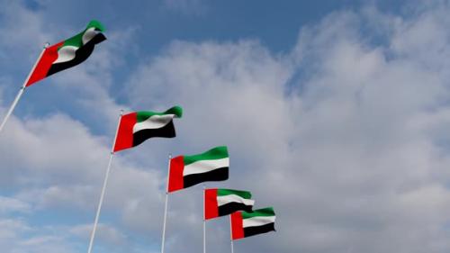 Videohive - Waving Flags Of The United Arab Emirates blue sky - 34521891