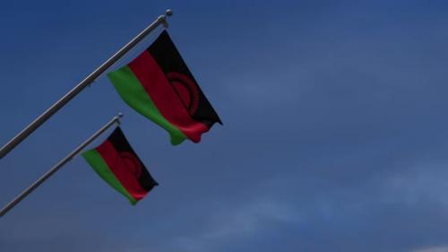 Videohive - Malawi Flags In The Blue Sky - 4K - 34514433