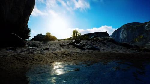 Videohive - Beach Coast of the Norwegian Sea with Mountains and Cliffs on Sunny Day - 34612058
