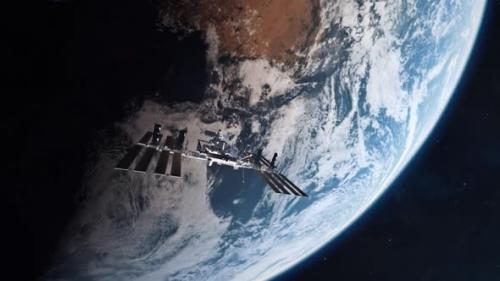 Videohive - International Space Station Entering Earth Atmosphere - 34924493