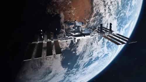 Videohive - International Space Station Medium Establishing Shot with Planet Earth - 34924494