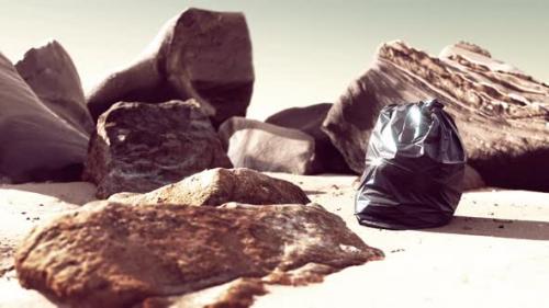 Videohive - Black Plastic Garbage Bag Full of Trash on the Beach - 34947754