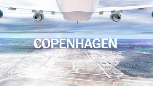 Videohive - Commercial Airplane Over Clouds Arriving City Copenhagen - 34966815
